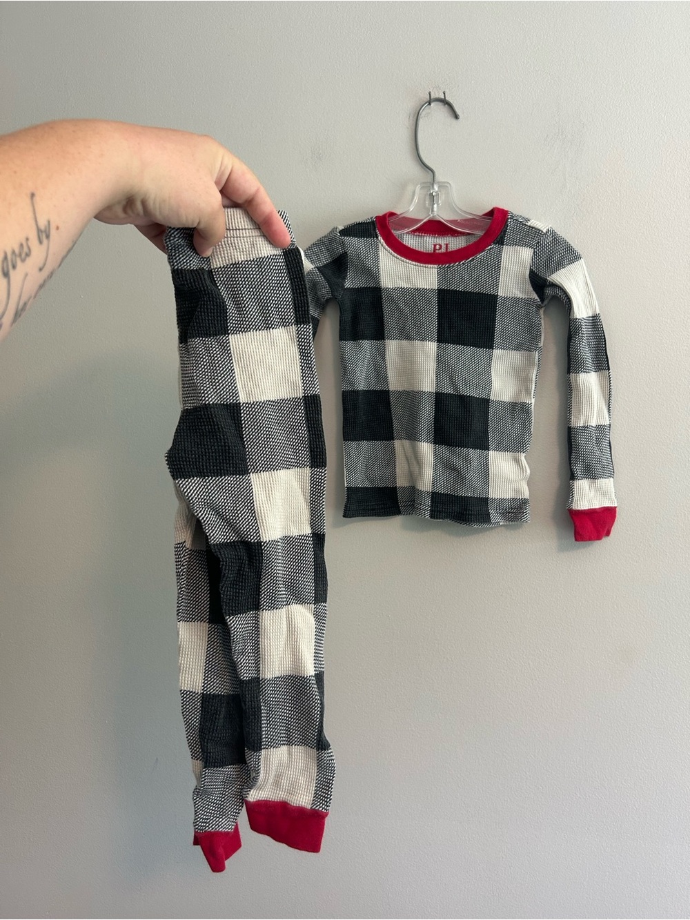 The children’s PJ place 3t Black & White Buffalo Plaid Pajama Set with Red Trim